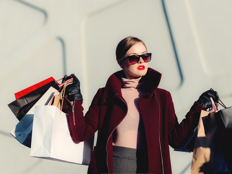 Shopper carrying retail bags